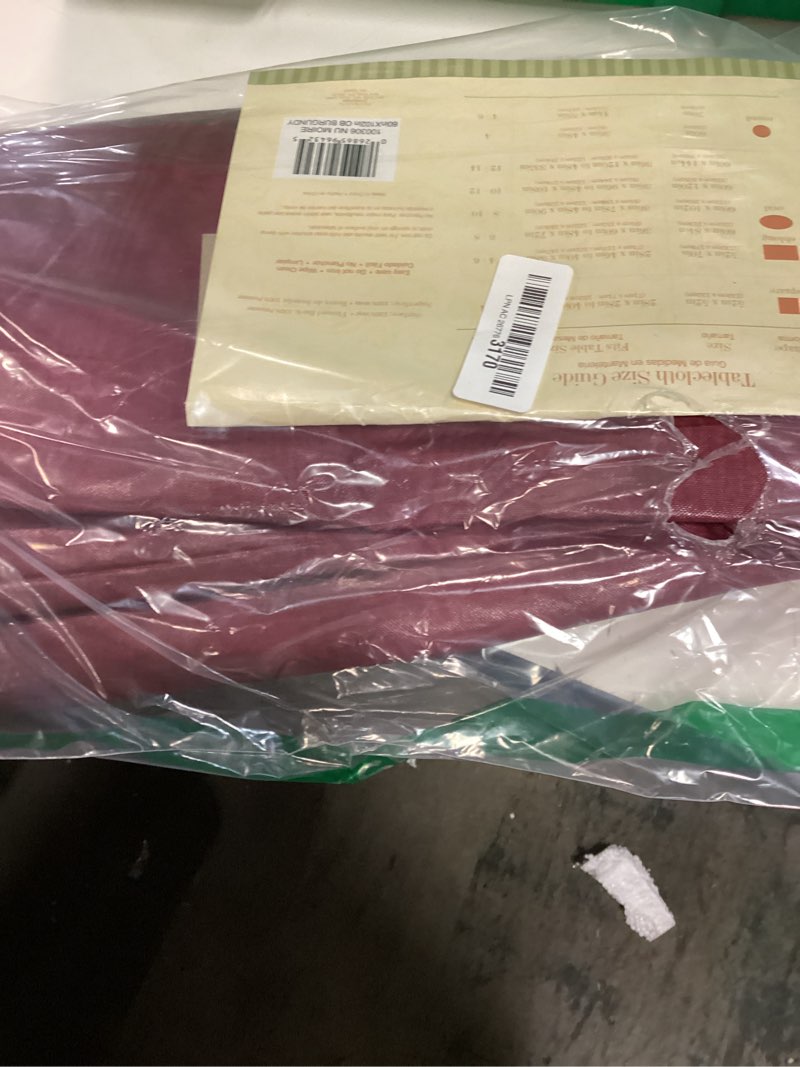 Condition photo showing New/Like New for Newbridge Burgundy Moire Wavy Solid Vinyl Flannel Backed Tablecloth, 60 x 102 Inch Rectangle, Heavyweight Indoor Outdoor Waterproof Table Cover, Easy Care Wipe Clean Burgundy 102" x 60" (Rectangular)