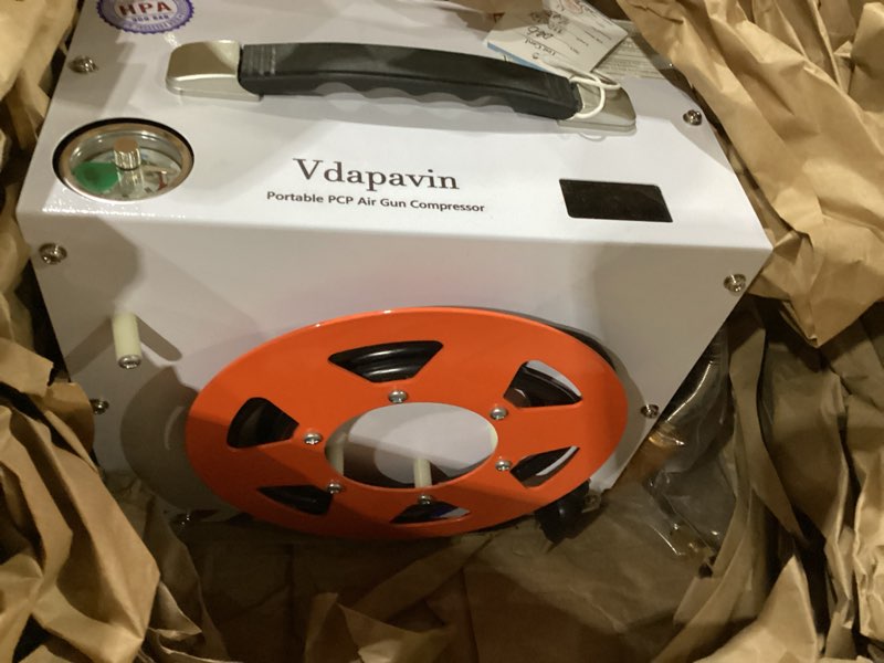 Condition photo showing As Is for pcp air compressor, portable 4500 psi/300 bar air pump, supports 12v dc or 120v/220v ac, auto-stop, oil-free/water-free design, for paintball, air rifle, hpa tanks orange and white
