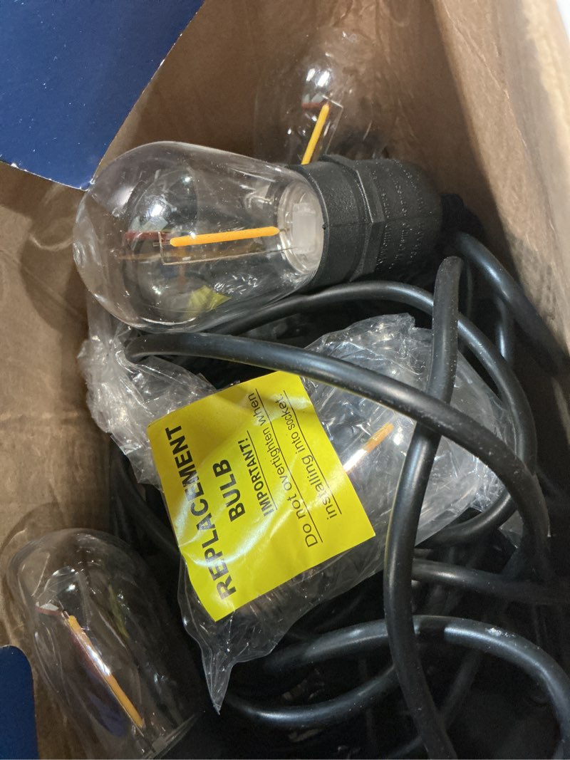 Condition photo showing As Is for harbor breeze 27-ft solar black indoor/outdoor string light with 10 white -light led edison bulbs