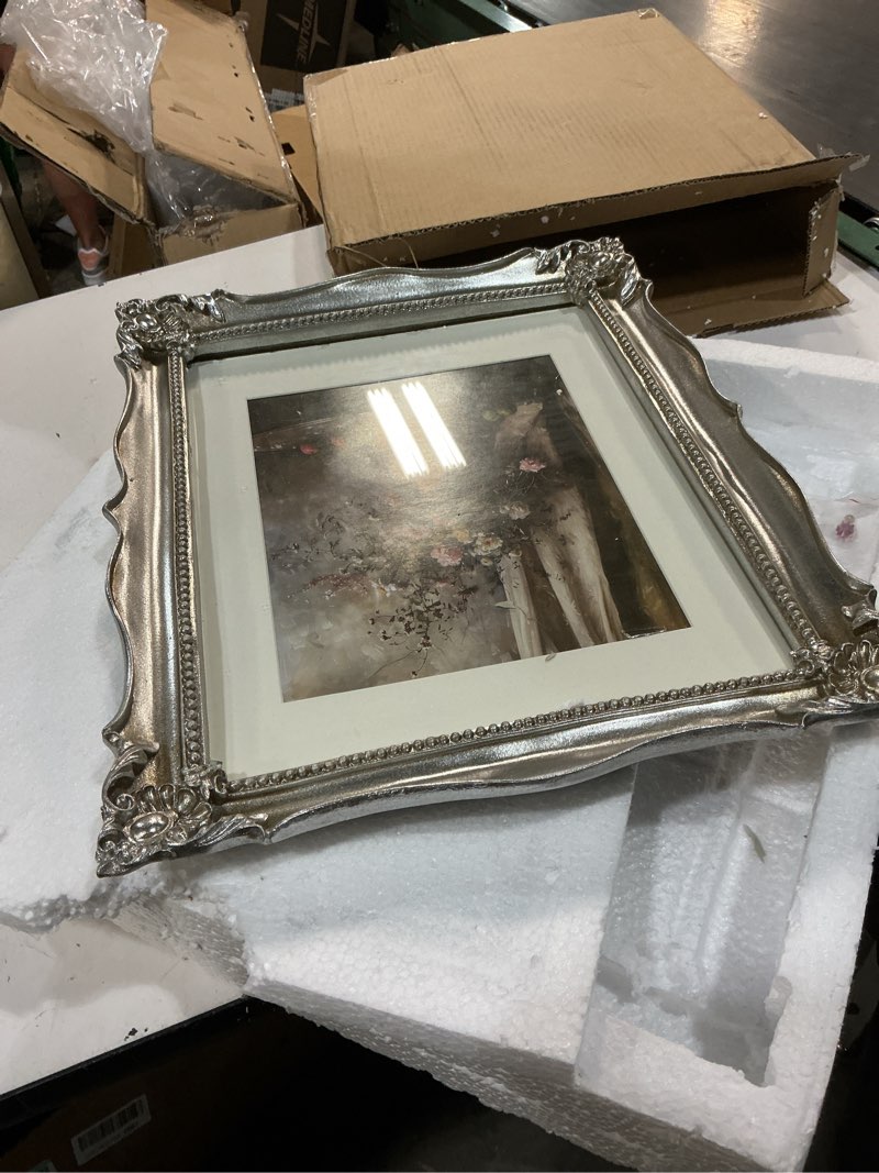 Condition photo showing Good Condition for 8x10 vintage picture frame with embossed flower design, silver ornate frame for 8x10 or 5x7 pictures with white mat, hand-crafted resin antique frames for tabletop & wall hanging, home decor (silver) silver 8x10