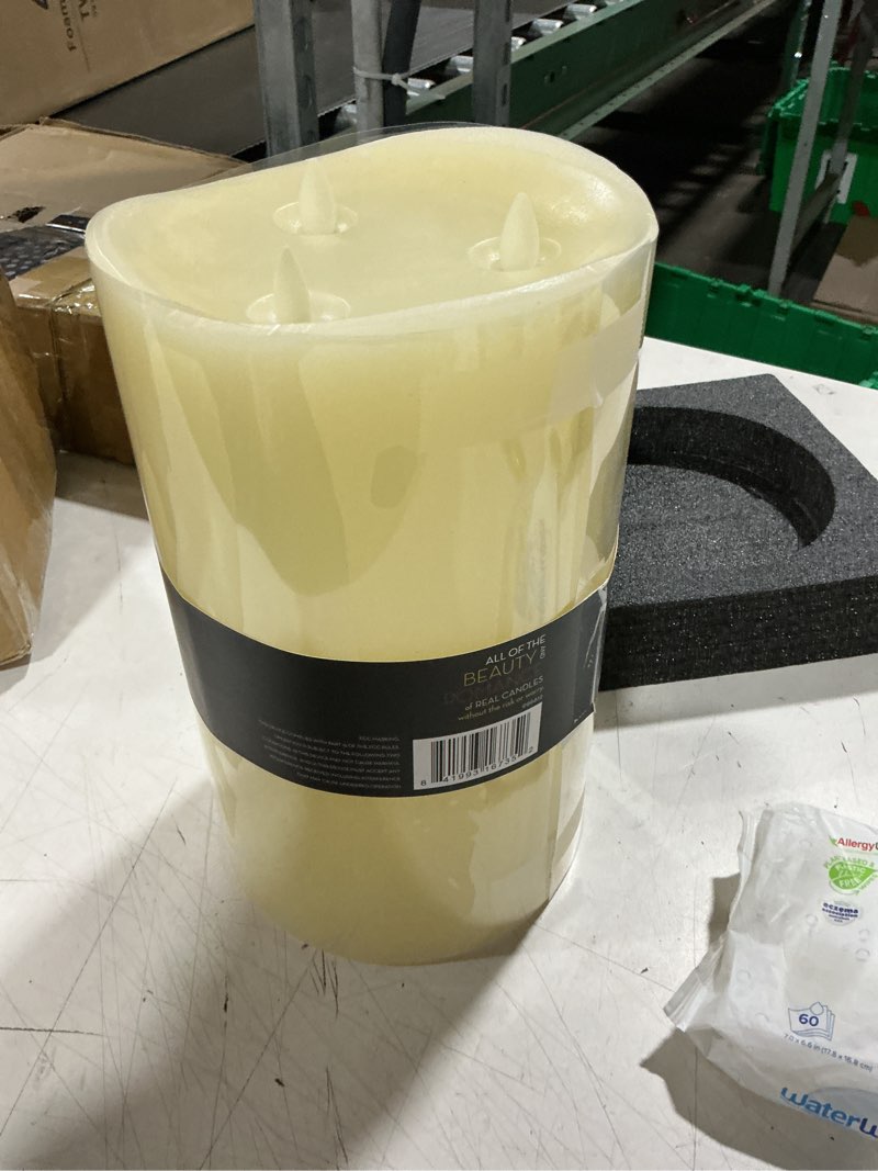 Condition photo showing Good Condition for luminara tri-flame flameless led candle, 5.8 x 9.7 inch white, moving flame, real wax, home decor, battery operated emergency light, safe for religious ceremonies