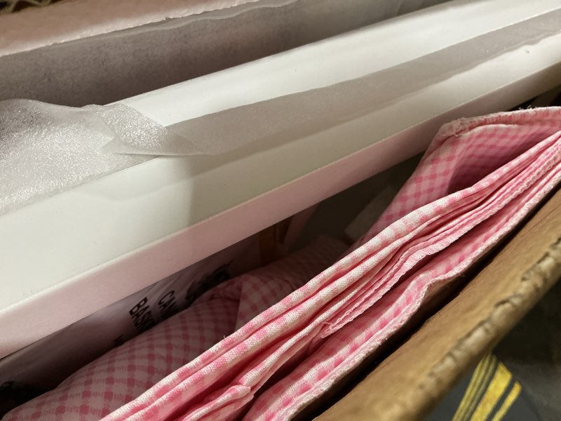 Condition photo showing As Is for Badger Basket Doll Crib with Bedding, Storage Baskets, Mobile & Personalization Kit - Ideal Nursery Set for Dolls Up to 22 Inches, Best for Doll Accessories & Playtime - White/Pink