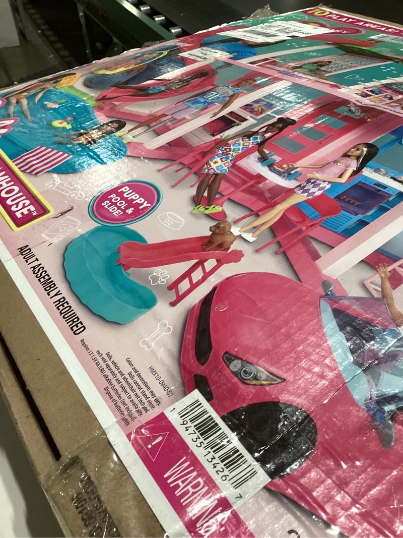 Condition photo showing New/Like New for barbie dreamhouse, pool party doll house with 75+ pieces and 3-story slide, house playset, pet eleva