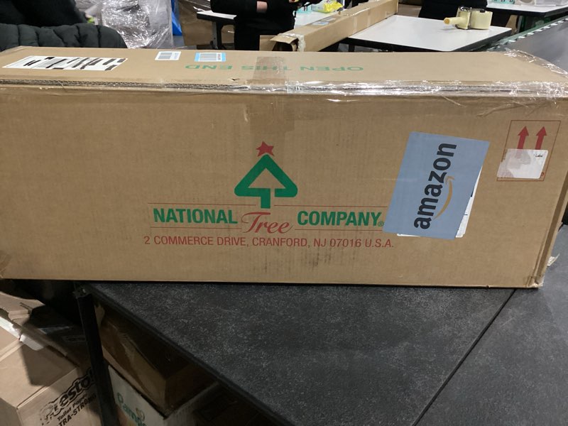 Condition photo showing New/Like New for National Tree Company 6 ft Pre-lit Artificial Christmas Tree, North Valley Spruce, 300 Clear Lights, Hinged Branches, 800 Branch Tips, Includes Stand, Green