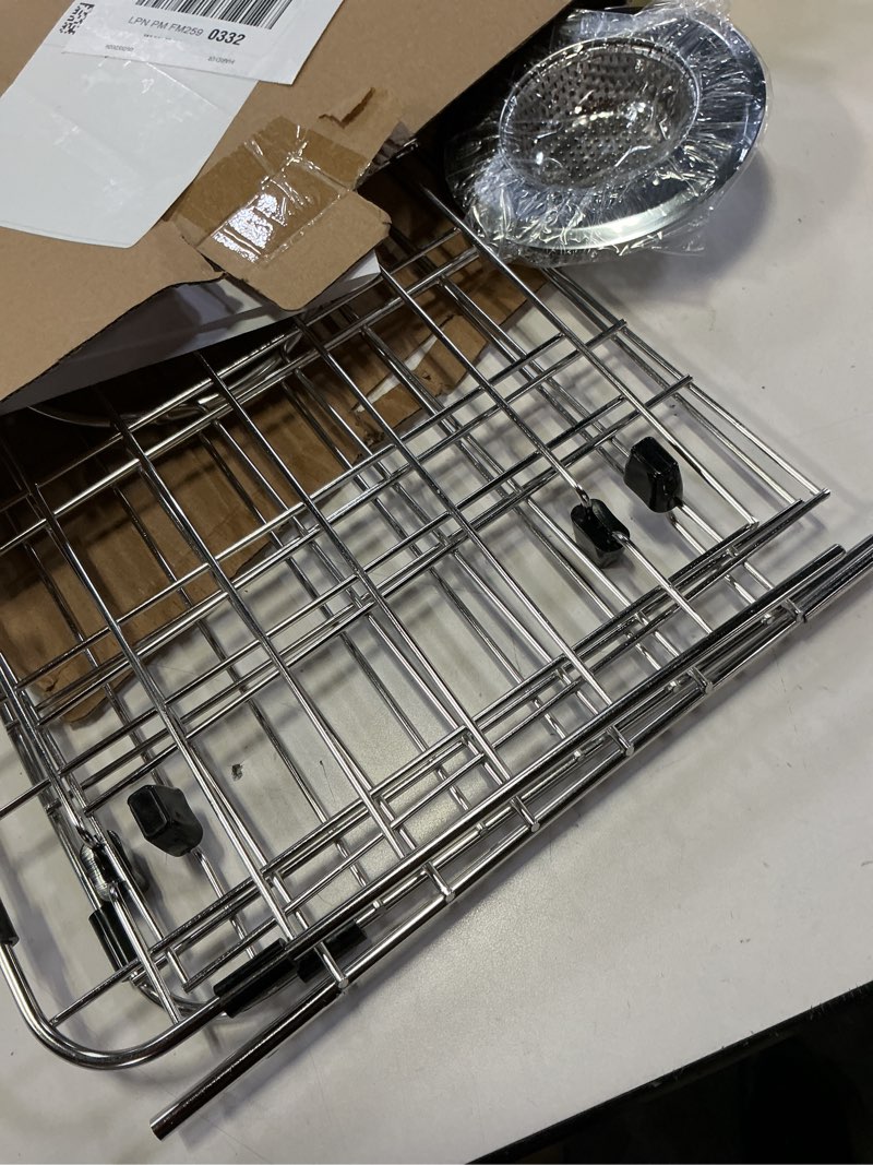 Condition photo showing As Is for Stainless Steel Sink Protector 27-9/16" x 14-9/16" with Rear Drain, Metal Sink Rack for Bottom of Sink, Kitchen Sink Grate and Sink Protectors with Sink Strainer (27-9/16" x 14-9/16" - Rear Drain) Detachable - 27-9/16" x 14-9/16" - Center Drain