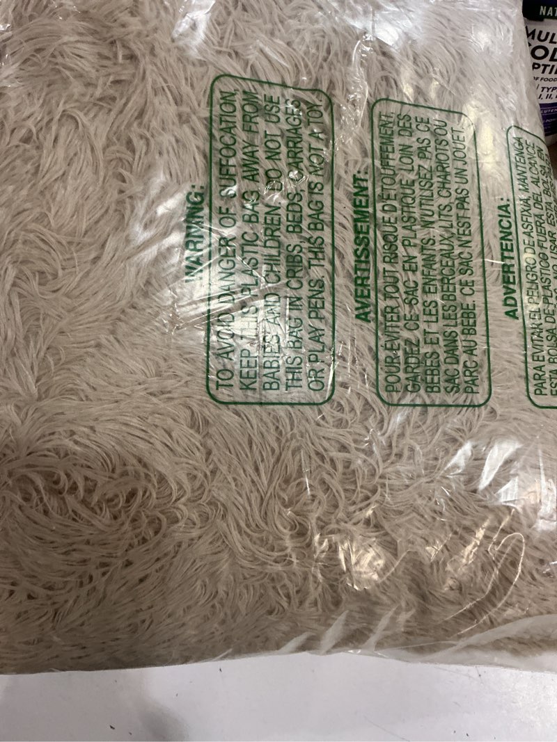 Condition photo showing Good Condition for olanly 2x3 machine washable small bedside rug, soft fluffy shaggy entryway throw rugs for bedroom, living room, indoor floor carpet for kids girls and boys, nursery rooms, home decor aesthetic, beige 2x3 ft beige