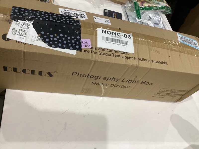 Condition photo showing Good Condition for DUCLUS Photo Light Box 24x24 inch, Portable Shooting Tent Kit, Professional Dimmable Photo Studio Light Box with 100 LED Beads & 6 Color Backdrops for Jewelry and Food Items Product Photography 24*24 inch