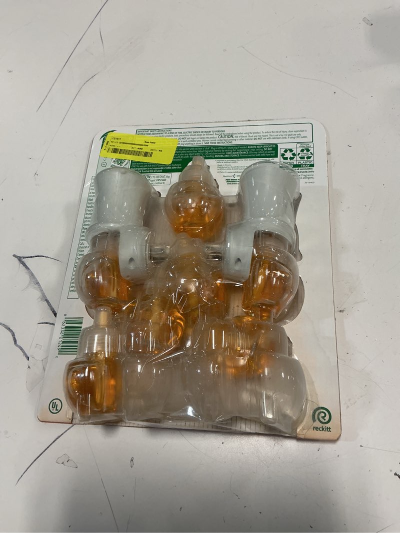 Condition photo showing Good Condition for air wick scented oil kit – hawaii exotic papaya & hibiscus flower (2 warmers + 8 refills)- with paper towel by oma