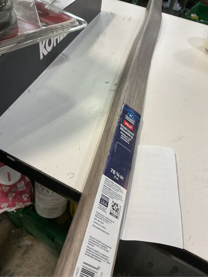 Condition photo showing As Is for MSI 2.75 in. x 94 in. x 0.75 in. Luxury Vinyl Flooring Flush Stair Nose Molding Trims, Waterproof Flush Stair Nose Molding Floor Trim, Use with NewlandsXL Collection, 7.9 Linear Feet, Victorian Ash,