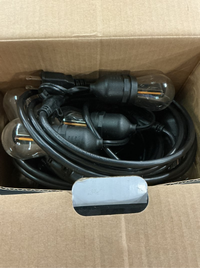 Condition photo showing As Is for hampton bay 24-light 48 ft. indoor/outdoor plug-in filament led s14 edison bulb string-light
