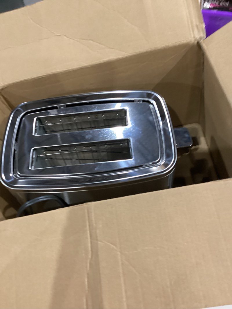 Condition photo showing Good Condition for GE 2 Slice Stainless Steel Toaster, Extra Wide Slots for Toasting Bagels, Breads, Waffles & More, 7 Adjustable Shade Settings, Removable Crumb Tray, Countertop Kitchen Essentials, 850 Watts 2-Slice Stainless Steel