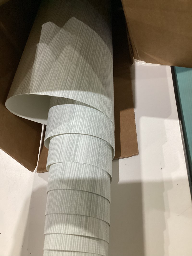 Condition photo showing As Is for NuWallpaper x Social Social Whisper Blue Classic Faux Grasscloth Peel & Stick Wallpaper Blue Wallpaper