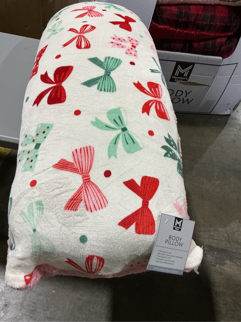 Condition photo showing New/Like New for member's mark plush body pillow, 52" x 20
