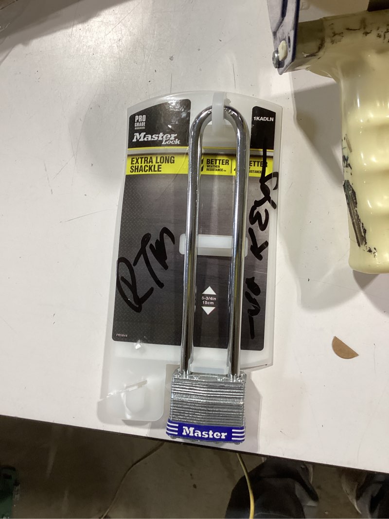 Condition photo showing As Is for master lock 1-3/4in wide laminated steel pin tumbler padlock, keyed alike