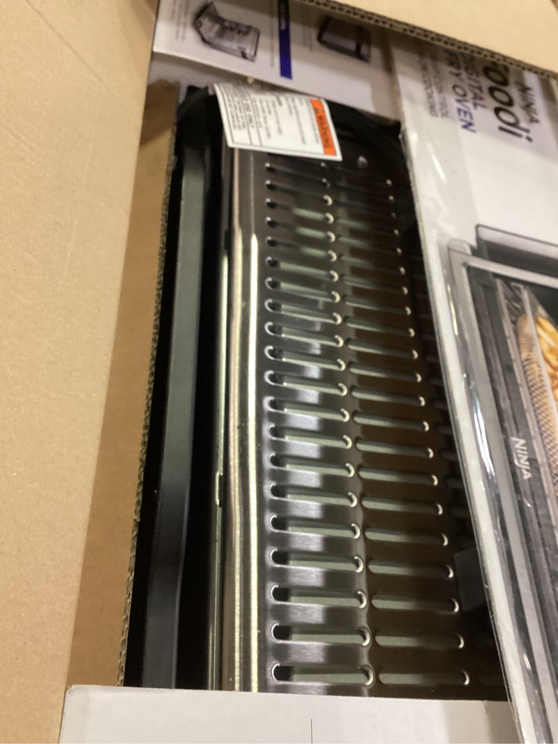 Condition photo showing Good Condition for Ninja Digital Air Fry Countertop Oven, 8-in-1 Functionality, 1800W, Flip-Up Design, XL Capacity, Air Fry Basket, Wire Rack & Crumb Tray, Silver, SP101 8-in-1 Flip Oven