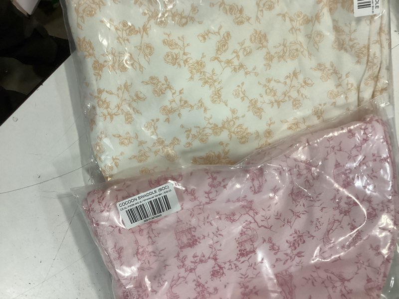 Condition photo showing Good Condition for Cocoon swaddle whimsical garden and bitty blooms