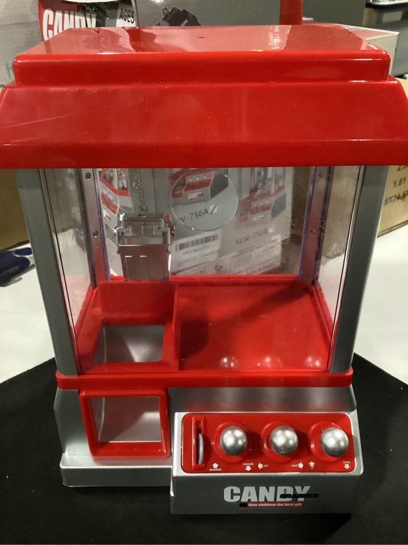 Condition photo showing As Is for japard claw machine for kids, mini candy vending machine, manual arcade game with adjustable sound, candy grabber prize dispenser, gifts for girls boys easter party