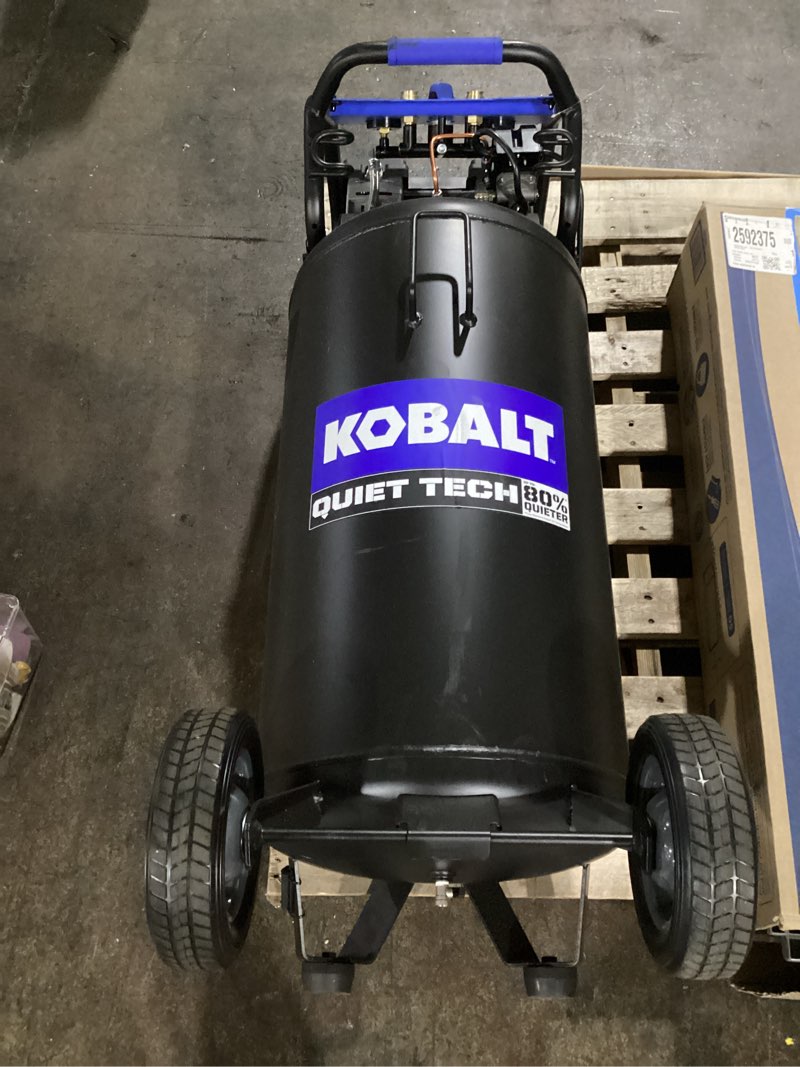 Condition photo showing As Is for kobalt quiet tech 26-gallon portable electric 150 psi vertical air compressor