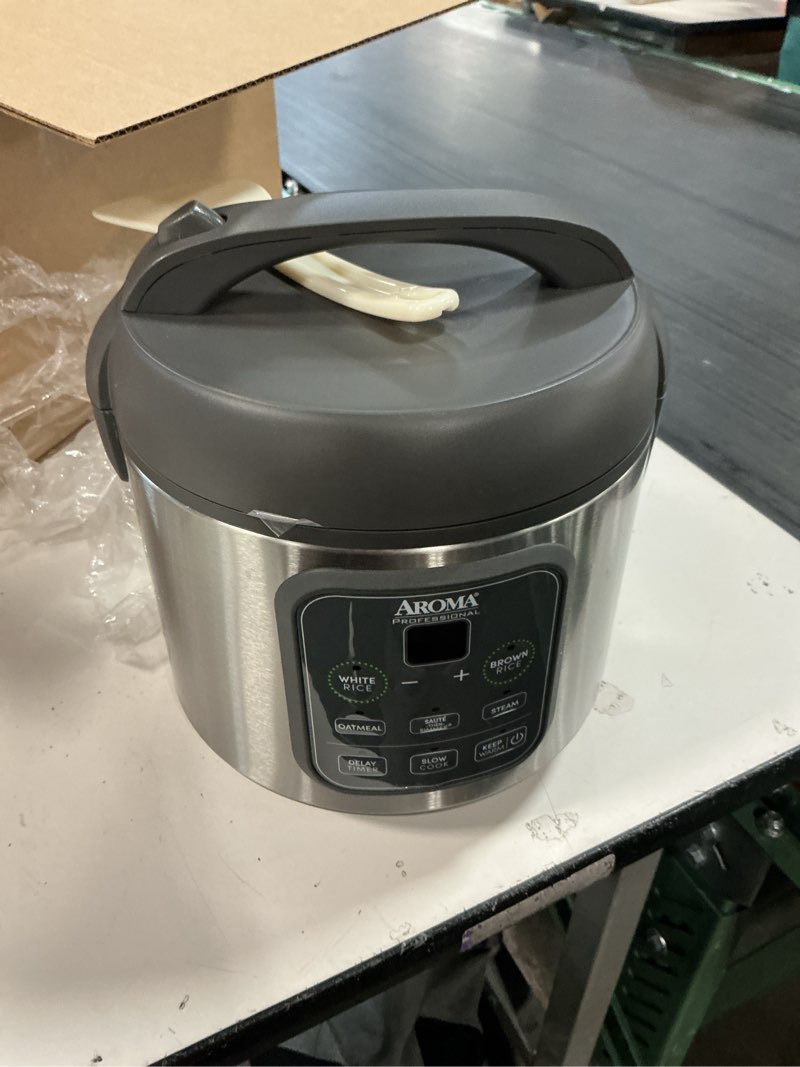 Condition photo showing As Is for AROMA Professional Digital Rice Cooker, Multicooker, 4-Cup (Uncooked) / 8-Cup (Cooked), Steamer, Slow Cooker, Grain Cooker, 2Qt, Stainless Steel Exterior, ARC-994SG