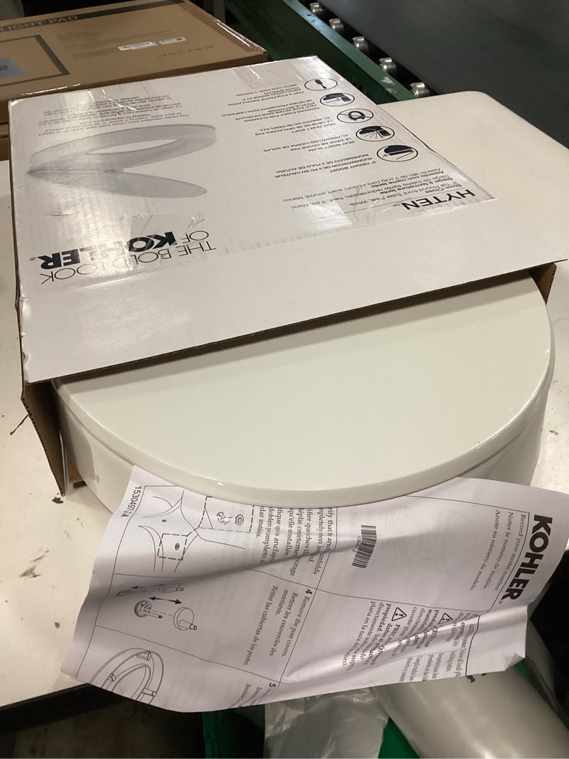 Condition photo showing Good Condition for kohler 25876-0 hyten 3" height, elevated soft close round toilet seat, contoured seat with grip-tight bumpers, quick-attach hardware, white white round