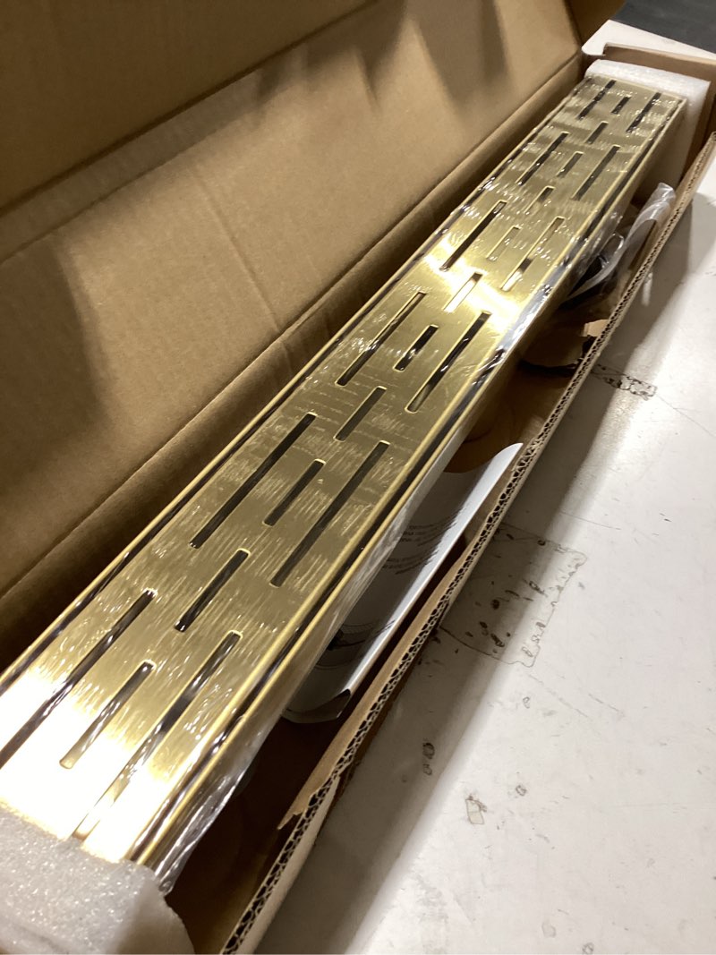 Condition photo showing Good Condition for brushed gold shower drain 24 inch, 304 stainless steel linear shower drain with removable brick pattern grate - adjustable rectangular shower floor drain with hair strainer, linear drain brushed gold 24 inch