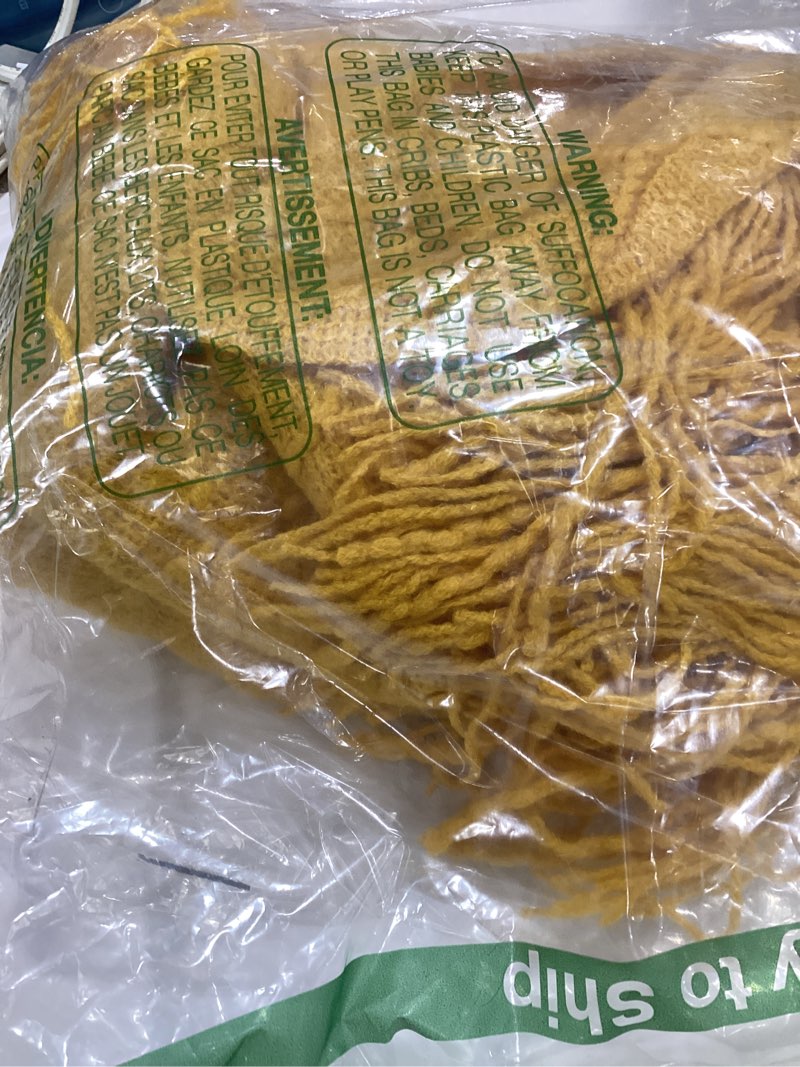 Condition photo showing item condition for PAVILIA Mustard Yellow Knit Throw Blanket for Couch Bed, Soft Knitted Farmhouse Sofa Throw for Living Room, Lightweight Decorative Fall Throw Blanket for Chair, Outdoor Textured Boho Blanket, 50x60 Mustard Yellow 50 x 60 Inches - Throw