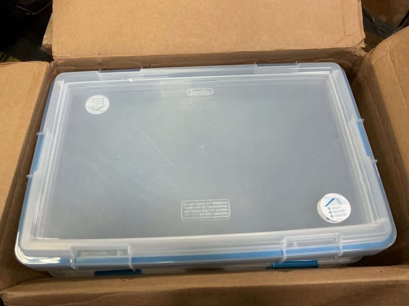 Condition photo showing As Is for Sterilite 120 Qt Wheeled Gasket Box, Stackable Storage Bin with Latching Lid, Handle and Tight Seal, Plastic Container with Clear Base and Lid, 3-Pack