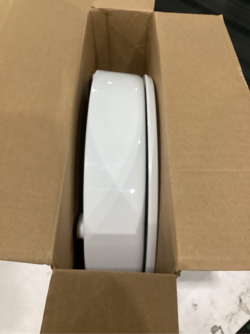 Condition photo showing As Is for kohler 25876-0 hyten 3" height, elevated soft close round toilet seat, contoured seat with grip-tight bumpers, quick-attach hardware, white white round