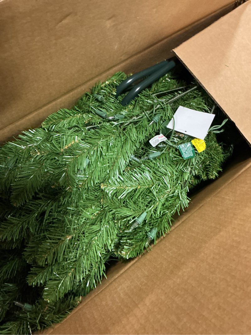 Condition photo showing Good Condition for National Tree Company 6.5 ft Pre-Lit Downswept Douglas Fir Artificial Christmas Tree, 650 Clear Lights, 1,227 Tips, Includes Stand, Green 6ft 6in Christmas Tree