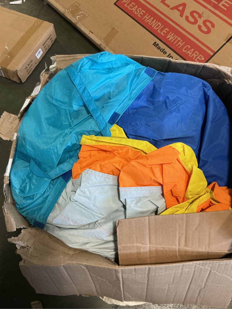 Multicolor bounce house with blower (unknown size and style)