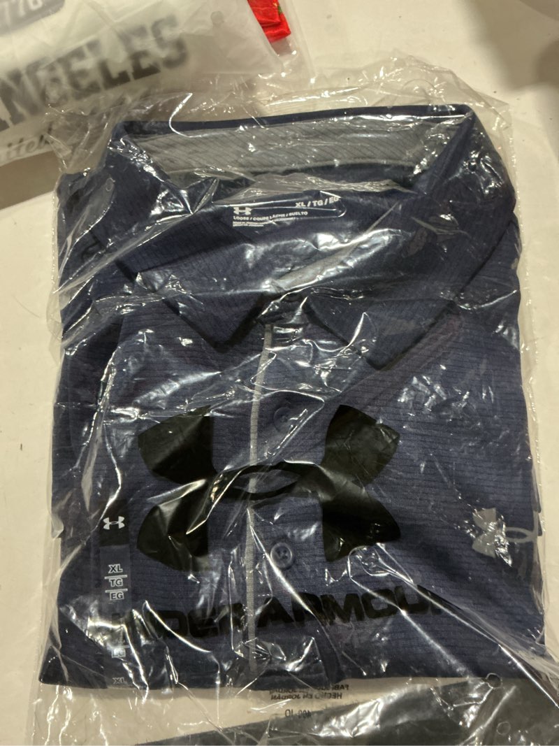 Condition photo showing Good Condition for Under Armour Men's Tech Golf Polo