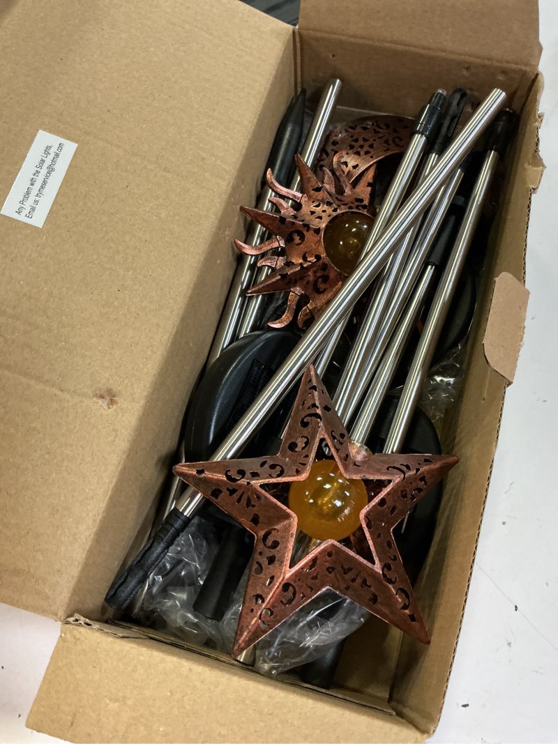 Condition photo showing Good Condition for solar garden stake lights, moon sun star yard decorations outdoor 3 pack solar garden decor for lawn, pathway, flower bed, memorial garden, patio outdoor gifts for mom, loved ones