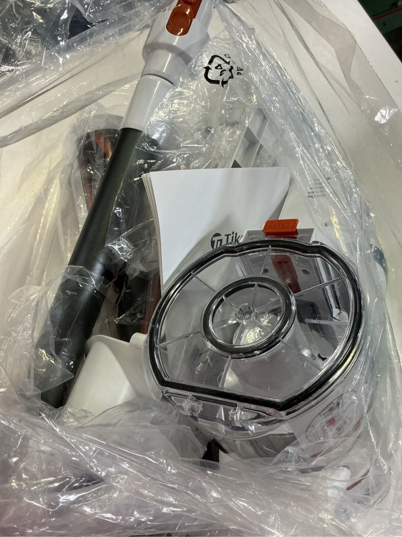 Condition photo showing As Is for tikom v500 cordless vacuum cleaner for home, 40000pa/450w stick vacuum with led touch screen, charging wall dock, anti-tangle, lightweight handheld vacuum for pet hair, hard floor, carpet orange&white