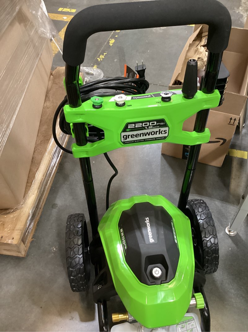 Condition photo showing As Is for greenworks 2200-psi 1.2-gpm cold water electric pressure washer with 4 spray tips