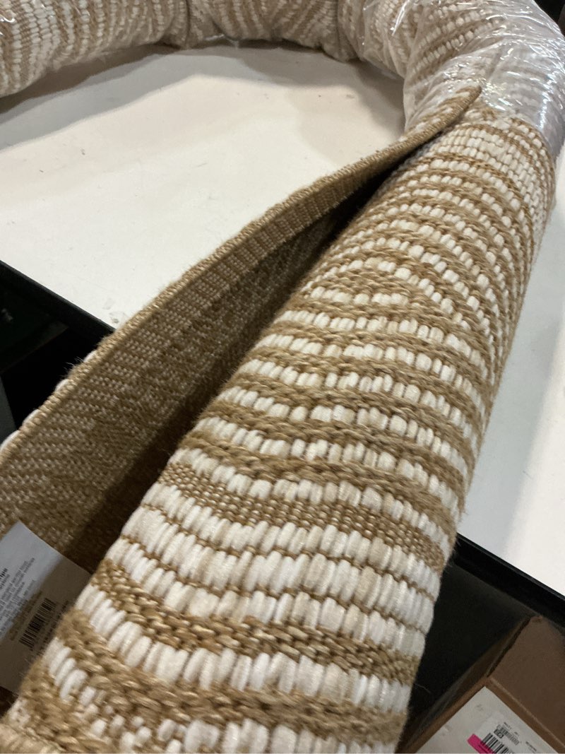 Condition photo showing Good Condition for 7'x10' wavy striped rectangular woven outdoor area rug ivory - threshold™