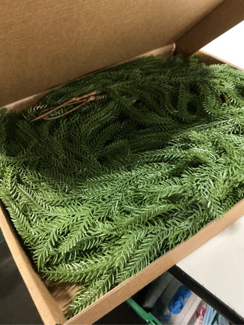 Condition photo showing New/Like New for cleangor 2pcs 6ft norfolk pine garlands realistic, real touch winter xmas garland, christmas decorations indoor outdoor, artificial holiday decor faux greenery for mantle, fireplace, table 6 ft 2