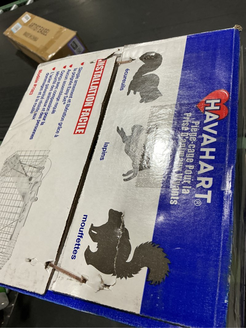 Condition photo showing New/Like New for havahart easy-set catch and release small 1-door humane live animal trap for squirrels, rabbits, skunks, and other small animals - 1083