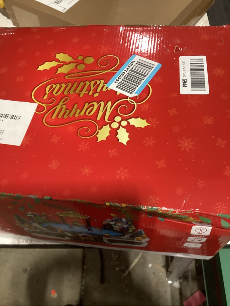 Condition photo showing As Is for Christmas Village House Christmas Collectible Buildings Decor Estatua de la cabaña del Pueblo navideño Home Decoration Snow Globe Display Skating Pond AnimatedChristmas Theme Park with 8 Music X-Large Skating XL