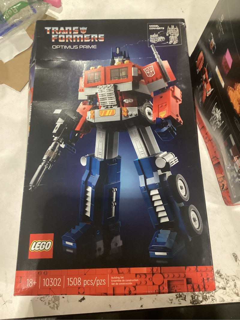Condition photo showing New/Like New for lego icons optimus prime 10302 transformers figure set, collectible transforming 2-in-1 robot and truck model building kit for adults, perfect for display or play