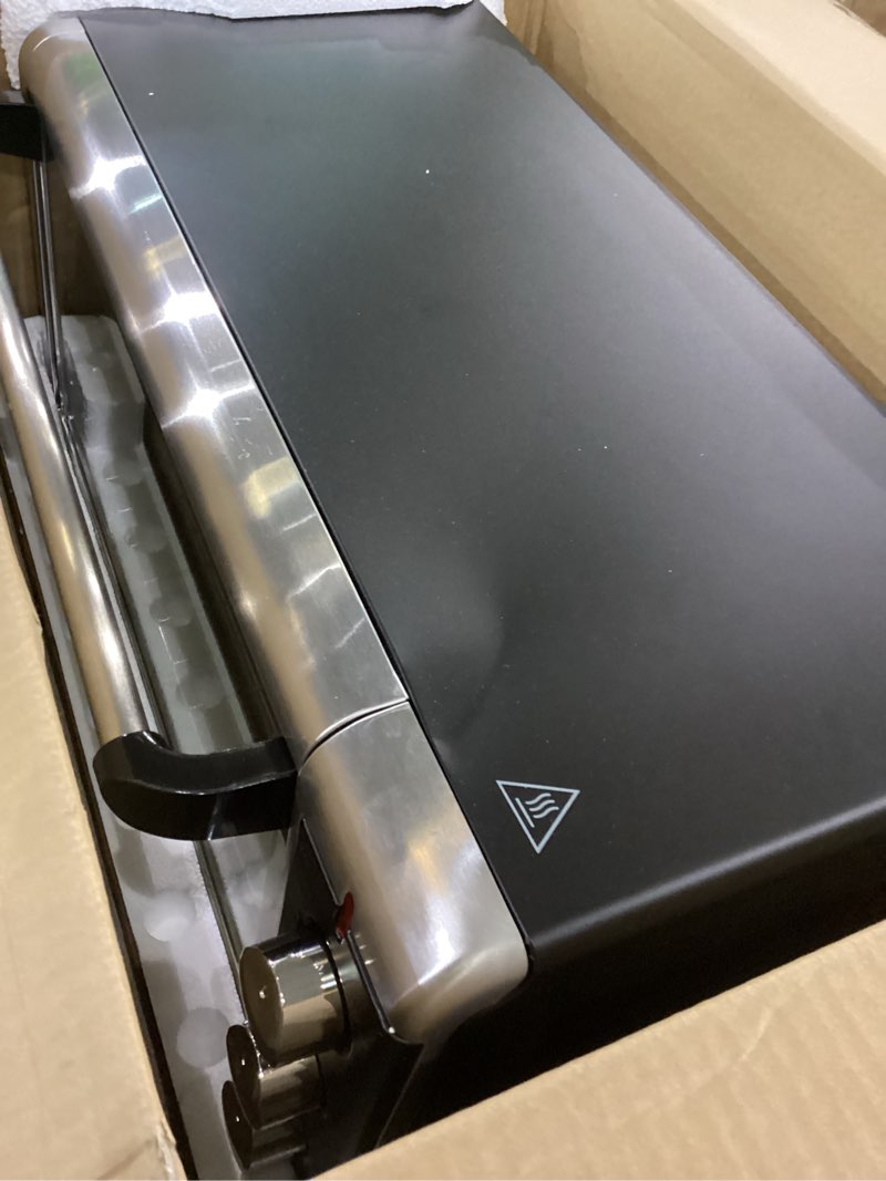 Condition photo showing As Is for BLACK+DECKER TO3250XSBD 8-Slice Extra Wide Convection Countertop Toaster Oven, Includes Bake Pan, Broil Rack & Toasting Rack, Stainless Steel/Black