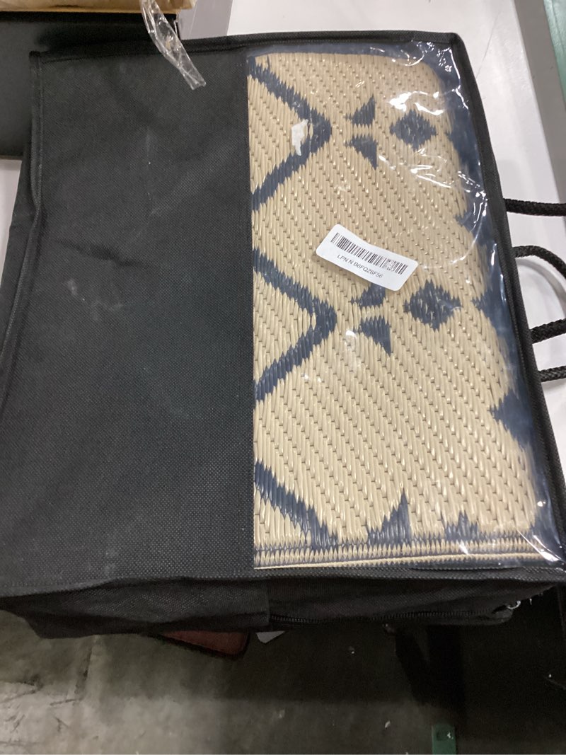 Condition photo showing Good Condition for Smiry Outdoor Rug 5x8 ft, Waterproof Reversible Plastic Straw Rugs, Boho Outdoor Area Rug, Outside Floor Mat for Patio, Backyard, Deck, Picnic, Beach, Camping, Beige