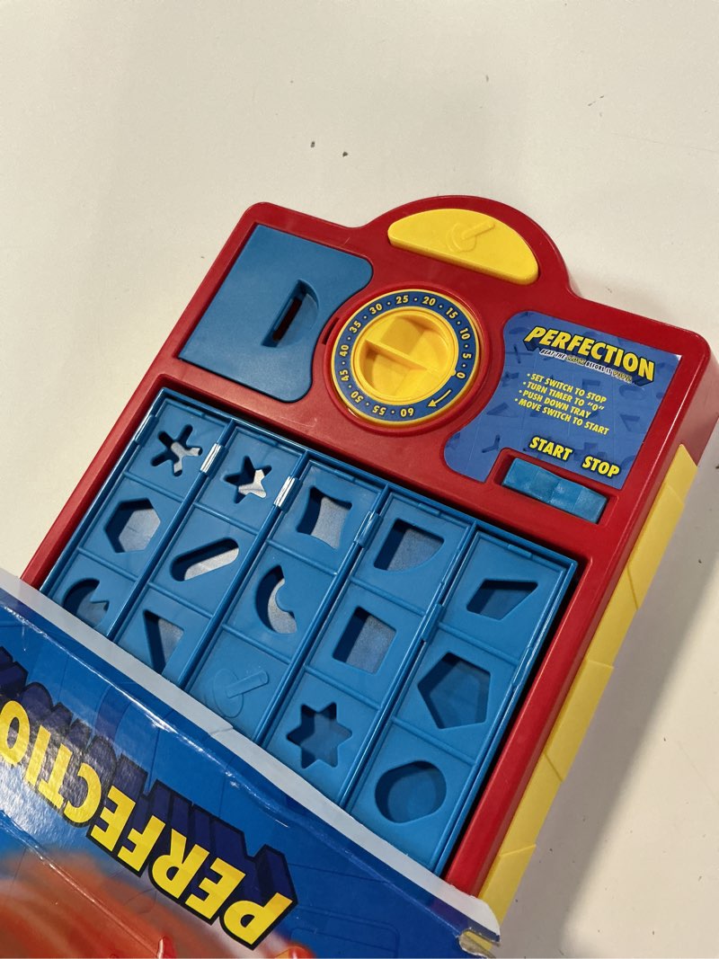Condition photo showing As Is for hasbro gaming perfection pop up game for kids ages 5 and up, customize the tray for over 250 combinations, kids games for 1+ players standard