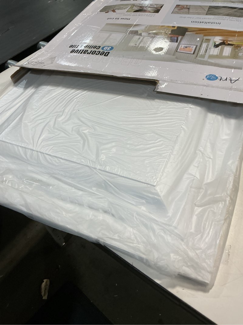 Condition photo showing Good Condition for Art3d 12-Pack Square Drop Ceiling Tile 2ft x 2ft in White, PVC Ceiling Panel 24 x 24in. - Compatible with 15/16" Drop Ceiling Grid System