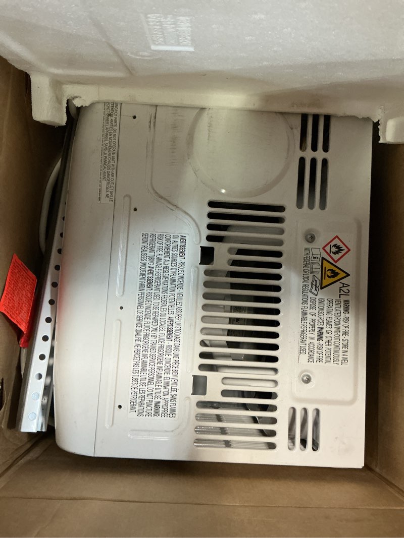 Condition photo showing Good Condition for frigidaire 5,000 btu window-mounted air conditioner, cools up to 150 sq. ft., quiet operation, effortless temperature control, 2 fan speeds, auto restart, white 5,000 btu mechanical controls
