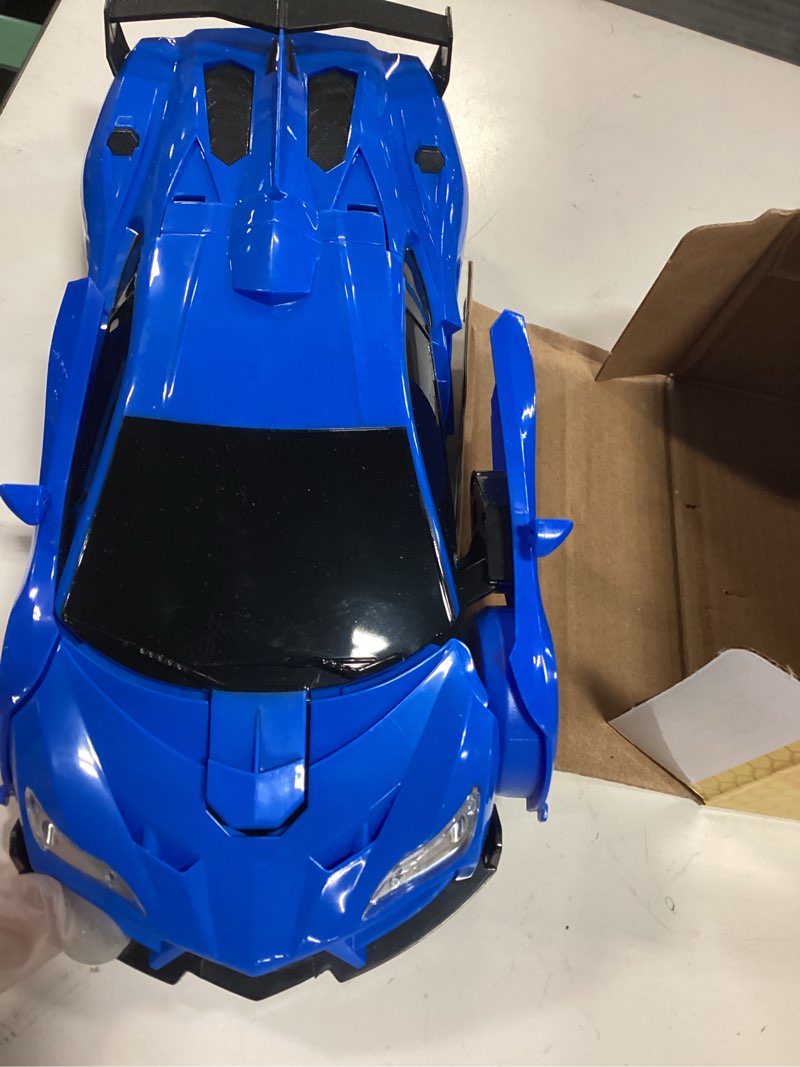 Condition photo showing Good Condition for qumcou transform remote control car, rc cars for boys age 3-5 6-8, one-button transform toy cars, 2.
