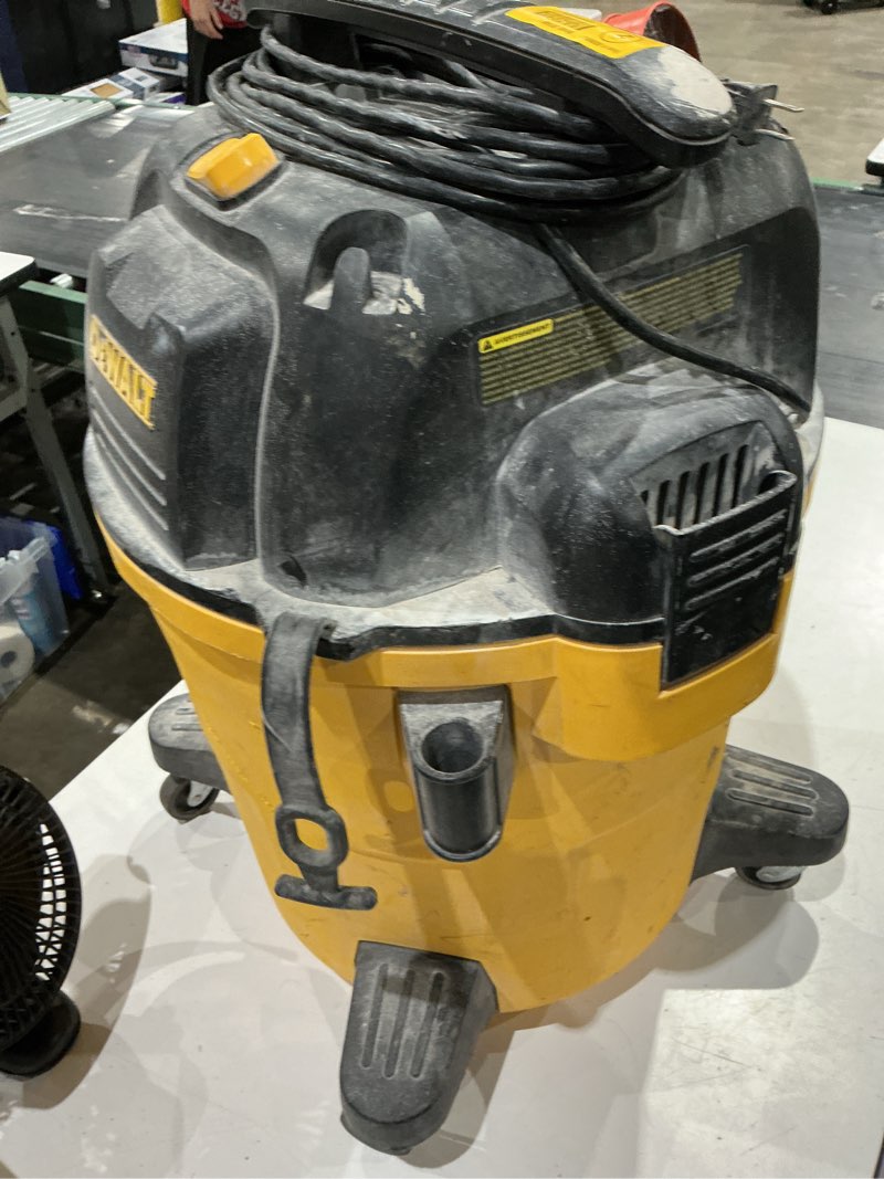 Condition photo showing As Is for dewalt stealthsonic quiet 12-gallon 5.5 hp corded wet/dry shop vacuum with accessories
