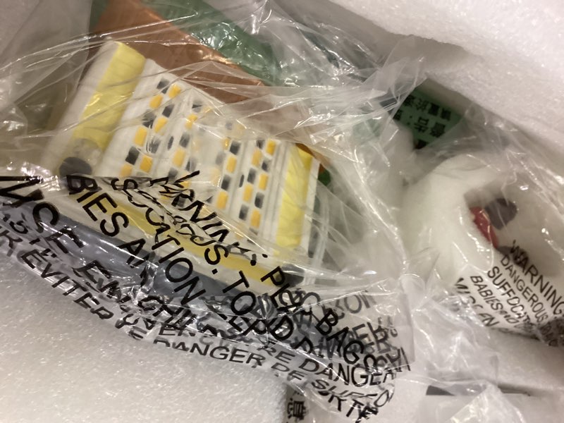 Condition photo showing New/Like New for Department 56 Original Snow Village National Lampoon's Christmas Vacation Pool Fantasy Lit Building and Figurine Set, 3 Inch, Multicolor