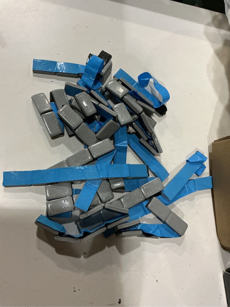 Condition photo showing As Is for 1 oz. stick on wheel weights, tire balancing wheel weights for cars, trucks, suvs, motorcycles, grey (1 box, 144pcs)