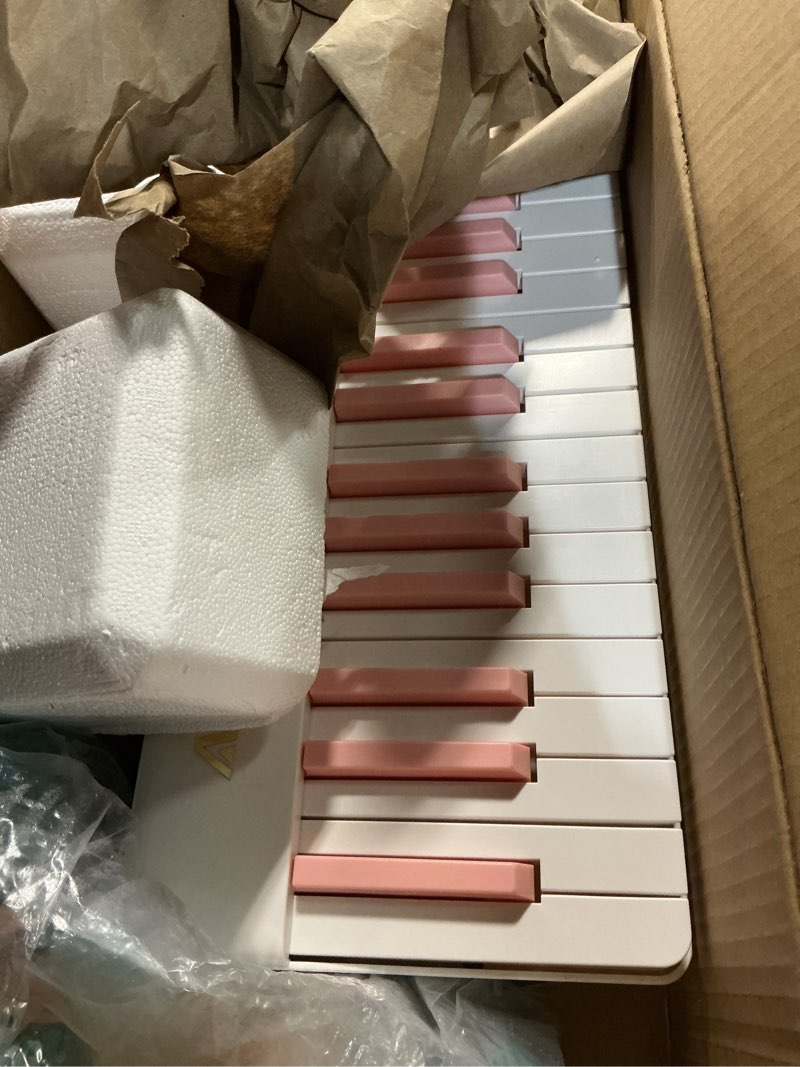 Condition photo showing As Is for AiJoy 88 Key Split Keyboard Piano – Magnetic Detachable, Portable & Ultralight,Full-size Travel Piano with Sensitive Keys, USB-MIDI, Carry Case, Gift for Girls, Kids & Beginner (ASP-10M) pink
