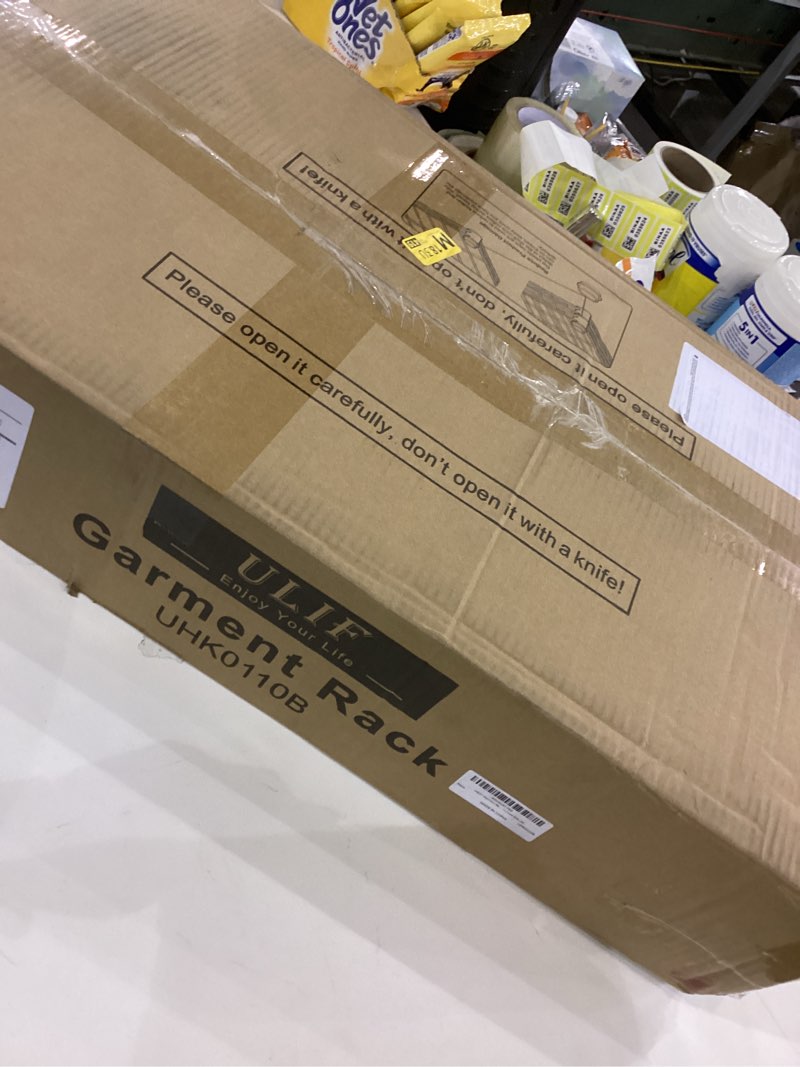 Condition photo showing New/Like New for Ulif E7 Garment Rack, Heavy Duty Clothes Storage System with Extendable Hangers Rods, Metal Clothe Rack with 6 Wire Shelves, (52.3"-72") W x 14.5" D x 71.2" H, Load 838 LBS Black